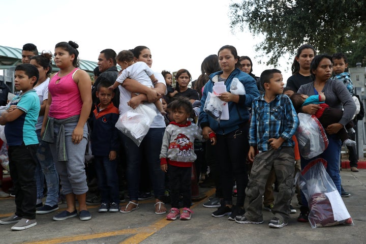 Undocumented immigrant families are released from detention at a bus depot in McAllen, Texas, U.S., June 25, 2018. 