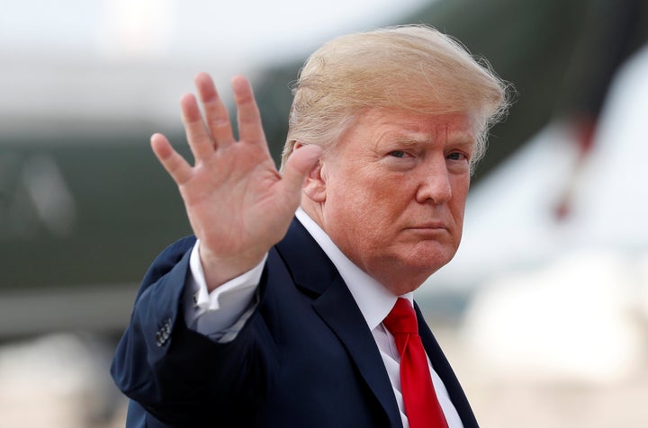 U.S. President Donald Trump waves as he boards Air Force One departing from Joint Base Andrews in Maryland, U.S. June 25, 201
