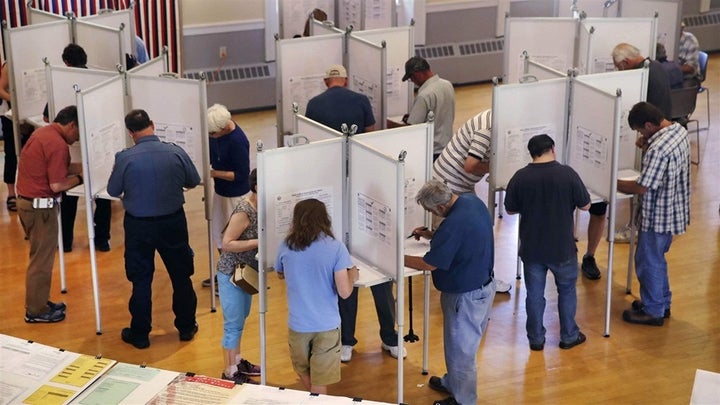 Residents of Kennebunk cast ballots in Maine’s first ranked-choice election. Maine is the first to adopt the system statewide.