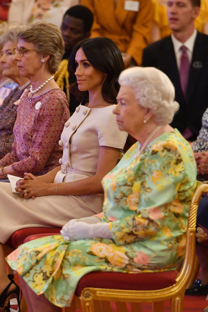 Queen Elizabeth II with the Duchess of Sussex at the Queen's Young Leaders Awards ceremony at Buckingham Palace.