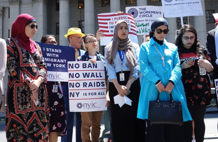 Members of the New York Immigration Coalition talk about the Supreme Court decision to uphold President Donald Trump's Muslim ban on June 26, 2018.