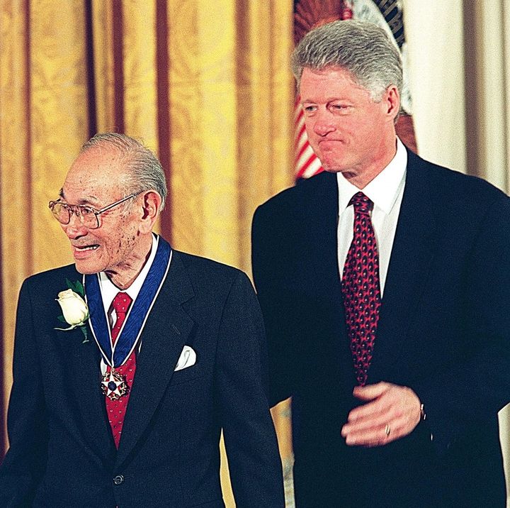 Fred Korematsu receives the Presidential Medal of Freedom, the nation's highest civilian honor, from President Bill Clinton in 1998.