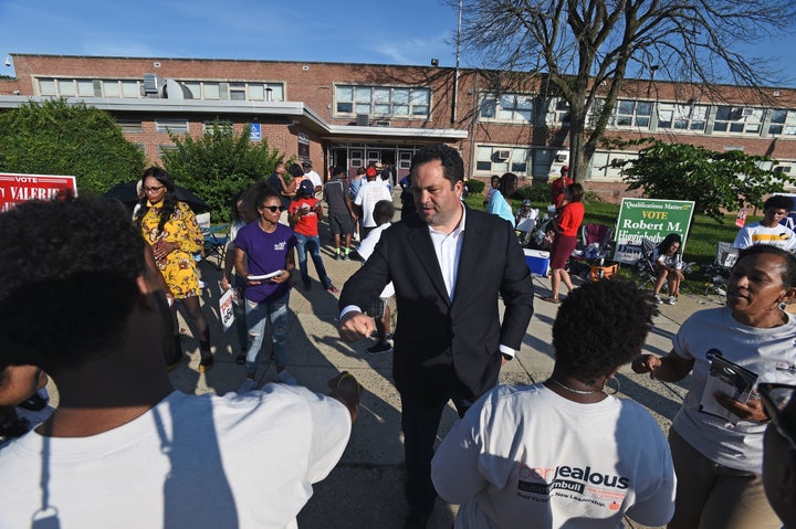 Democratic gubernatorial candidate Ben Jealous thanks his campaign workers during a visit to a polling place in Baltimore on