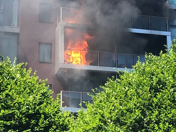 Flames engulfed the balcony of an apartment at a luxury development near Battersea on Wednesday.