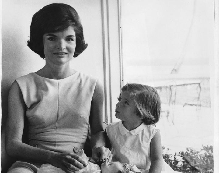 Kennedy and her daughter Caroline. Caroline was born via planned cesarean section in 1957 following the stillborn birth of Kennedy's daughter Arabella in 1956.