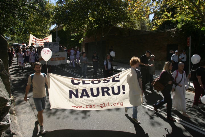 A small group of activists staged a protest at the front of Prime Minister John Howard's residence, Kirribilli House, demanding change to the federal government's mandatory detention policy in April 2006.