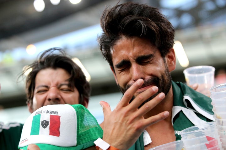 Mexico's fans react as their team loses to Sweden at Russia's Ekaterinburg Arena Stadium. 