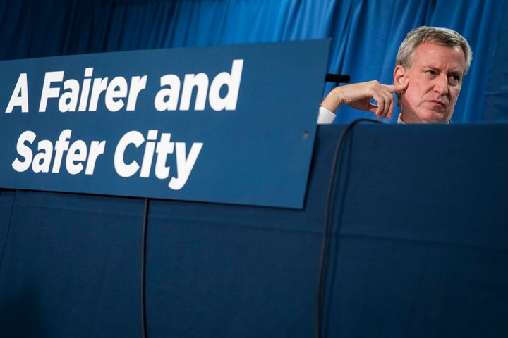 New York City Mayor Bill de Blasio looks on during a news conference.