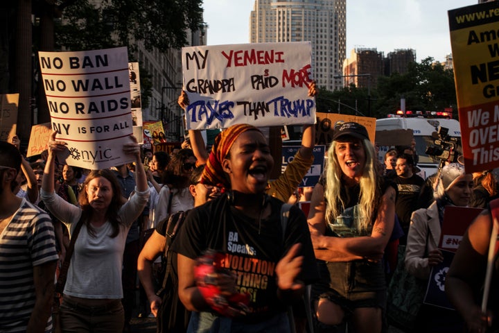 Demonstrators protest the Supreme Court's travel ban decision outside of Manhattan Federal Court on June 26, 2018.