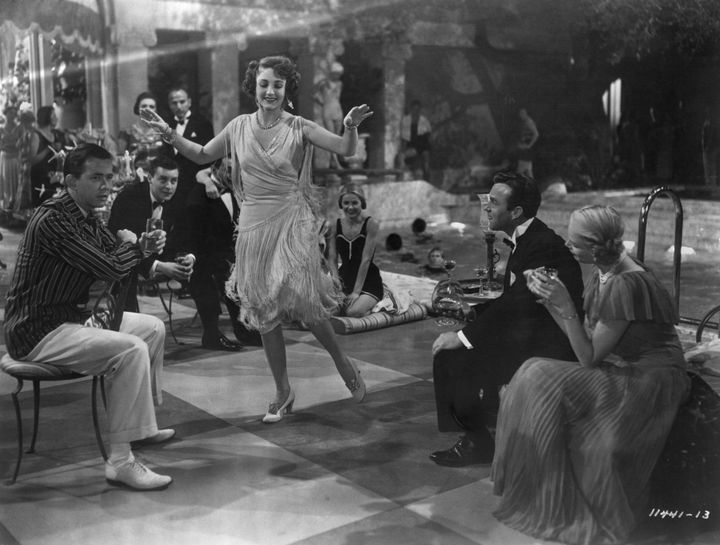 Actress Betty Field dances the Charleston during a poolside party scene from the 1949 movie