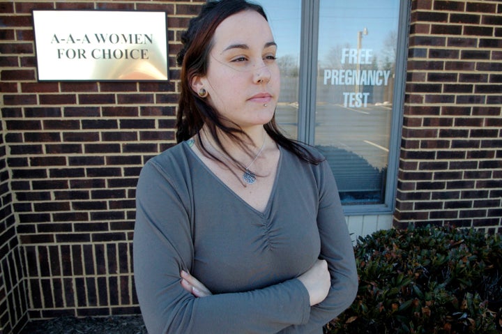 Allyson Kirk, 24, stands outside the A-A-A Women For Choice clinic, a crisis pregnancy center, March 2, 2007, in Manassas, Vi