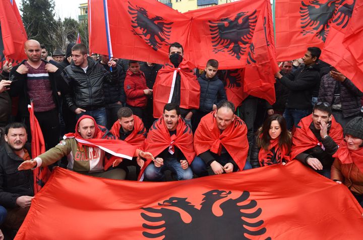Representatives of the Albanian Cham community protest in front of the Greek Embassy to demand recognition of their property claims in Greece, on February 24, 2018 in Tirana. Albania and Greece are in a negotiating process for the delimitation of the sea border along with talks on other unresolved issues between the two neighbouring countries. The ongoing negotiations have caused protests on both sides of the border. 