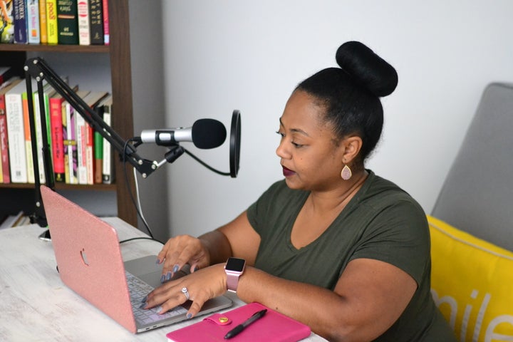 Joy Harden Bradford recording a podcast.