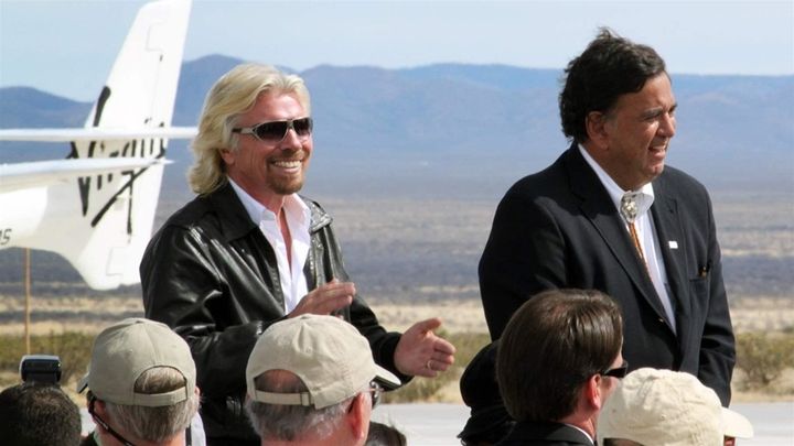Virgin Galactic founder Richard Branson, left, and former New Mexico Gov. Bill Richardson, a Democrat, stand together at a runway dedication ceremony at Spaceport America in Truth or Consequences, New Mexico. Branson’s company is a major tenant of the facility but has yet to begin commercial space tourism flights. 