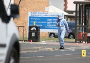 Forensic investigators at the scene in Romford, east London