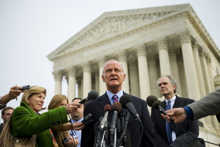 Massachusetts Attorney General Tom Reilly speaks outside the U.S. Supreme Court about the Massachusetts v. EPA case in Novemb