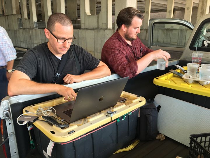 Capital Gazette reporter Chase Cook, right, and photographer Joshua McKerrow work on Friday's newspaper while awaiting news of their colleagues in Annapolis, Maryland.
