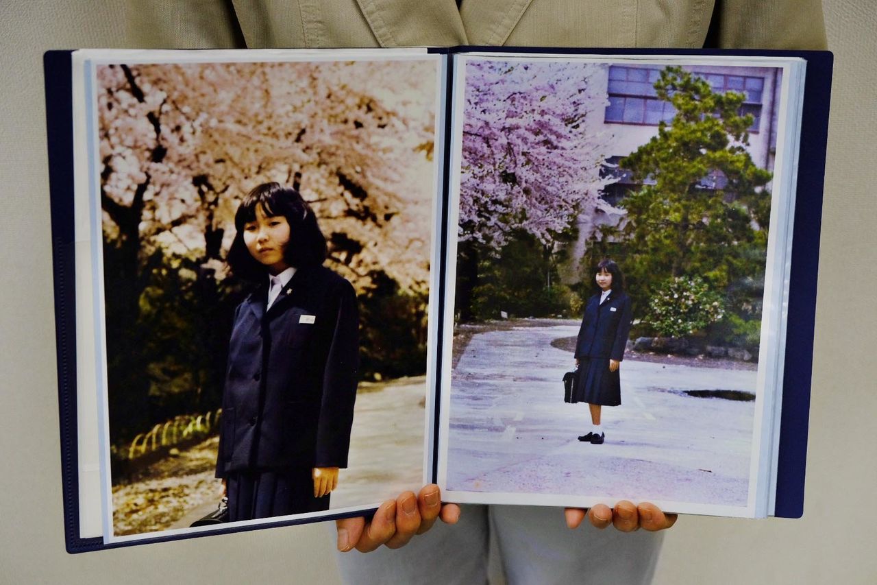 Sakie Yokota holds up a photo of her 13-year-old daughter Megumi, whom North Korea kidnapped in 1977.