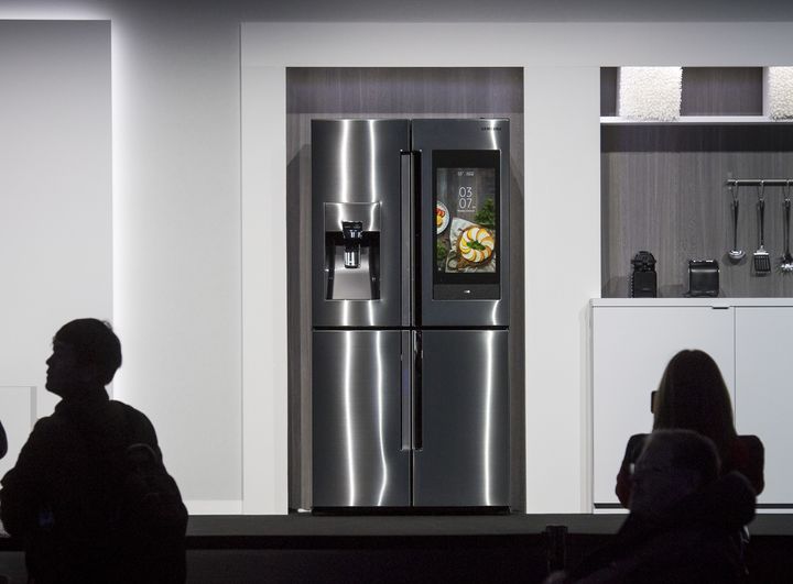 Samsung's new Family Hub smart fridge knows what's inside and can even help you re-order new food using Whisk's technology.