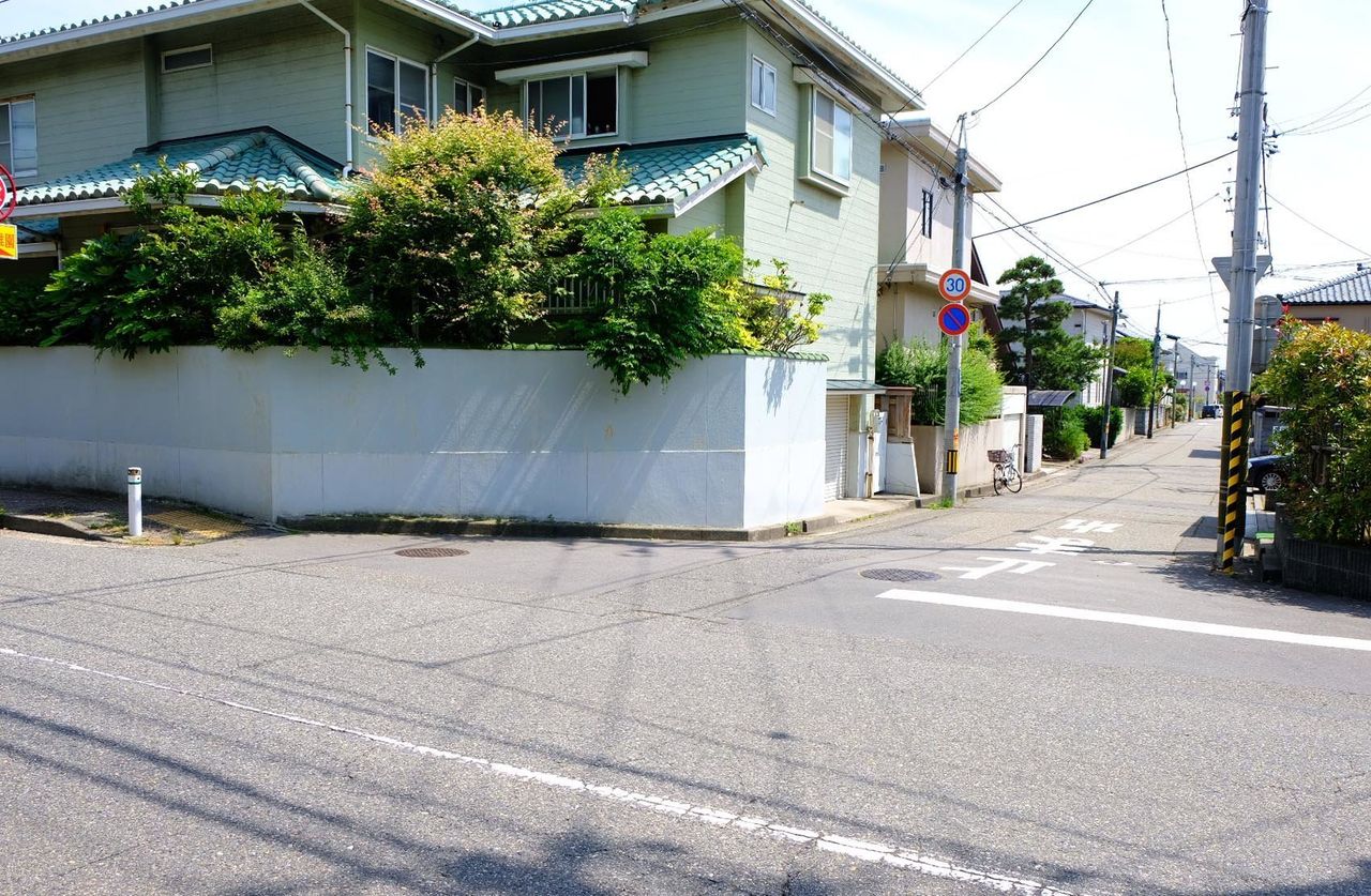 This is the intersection where police dogs lost Megumi Yokota's trail. A short walk down the alleyway is the Yokotas' former home.