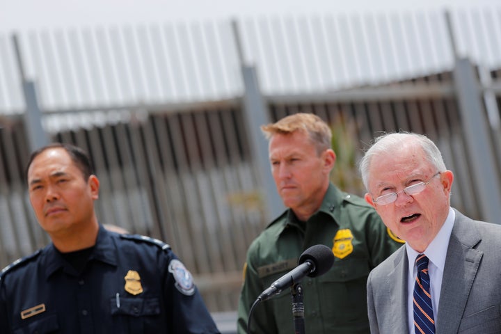 U.S. Attorney General Jeff Sessions holds a news conference next to the U.S.-Mexico border in San Diego to discuss immigration enforcement actions on May 7. A month earlier, he announced the administration's "zero tolerance" policy.