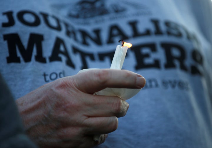 Capital Gazette staffer Pat Furgurson takes part in a candlelight vigil in Annapolis, June 29, 2018.