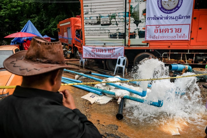 Pumping machines are being used to the water blocking the main entrance of the cave.