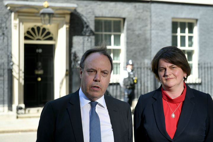 Arlene Foster, Leader of the Democratic Unionist Party, and the party's deputy leader, Nigel Dodds, leave Downing Street following a meeting with Prime Minister, Theresa May,