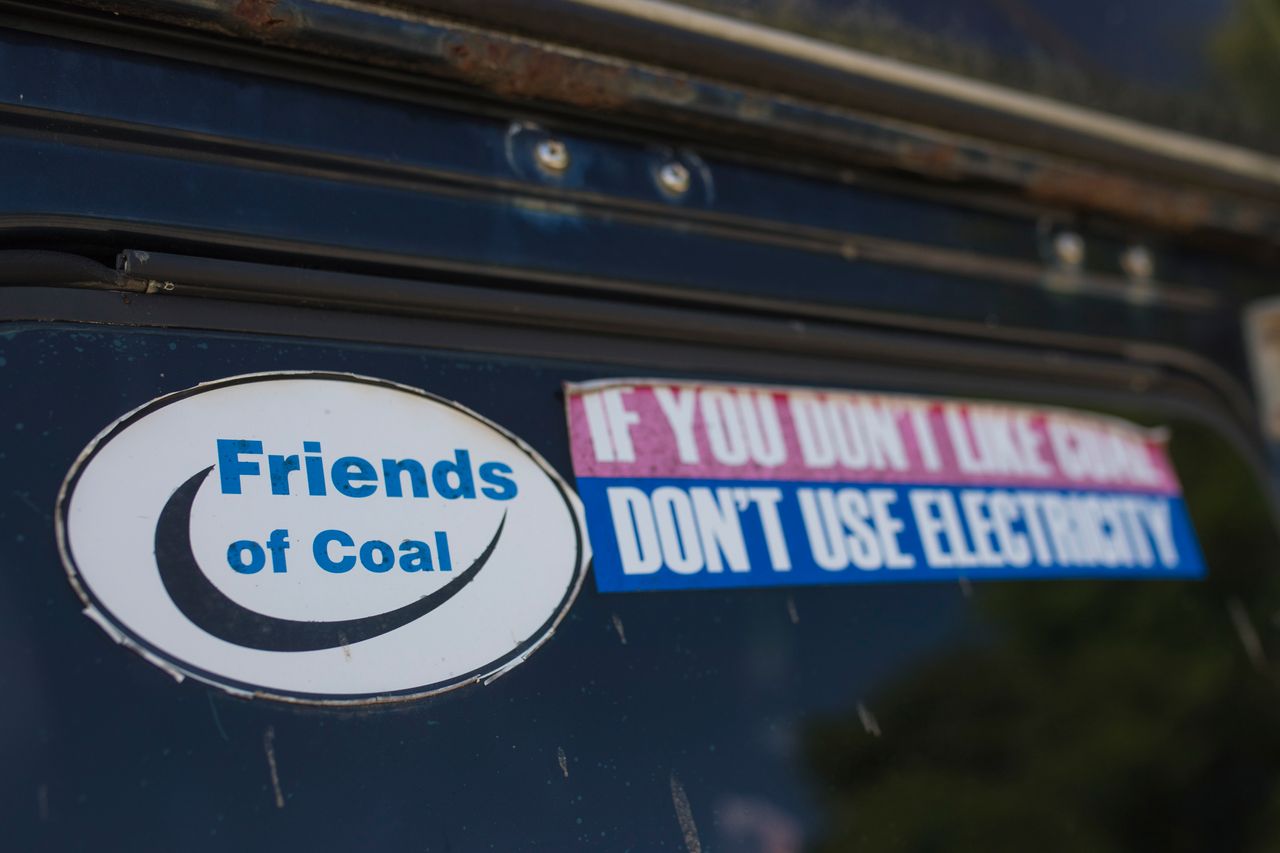 Bumper stickers on a car window in neary Whitesburg, Kentucky, illustrate a resident's support for the struggling coal industry in the area.