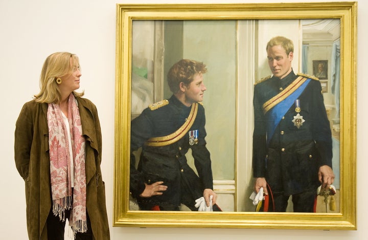 Nicky Philipps stands with her work, 'Prince William and Prince Harry: a new portrait by Nicky Philipps' at the National Portrait Gallery on Jan. 6, 2010. 