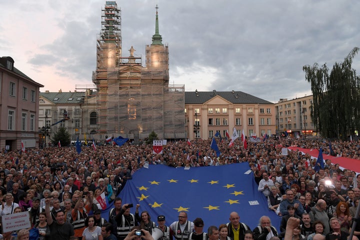 Protesters gather outside the Supreme Court building in Warsaw on Tuesday night.