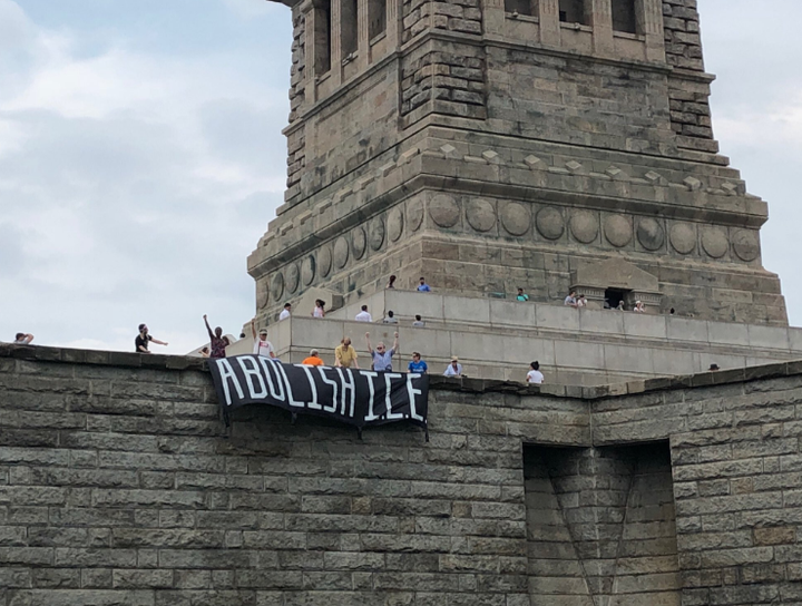 Rise and Resist, a New York-based group that focuses on immigration policy, claimed responsibility for the banner.