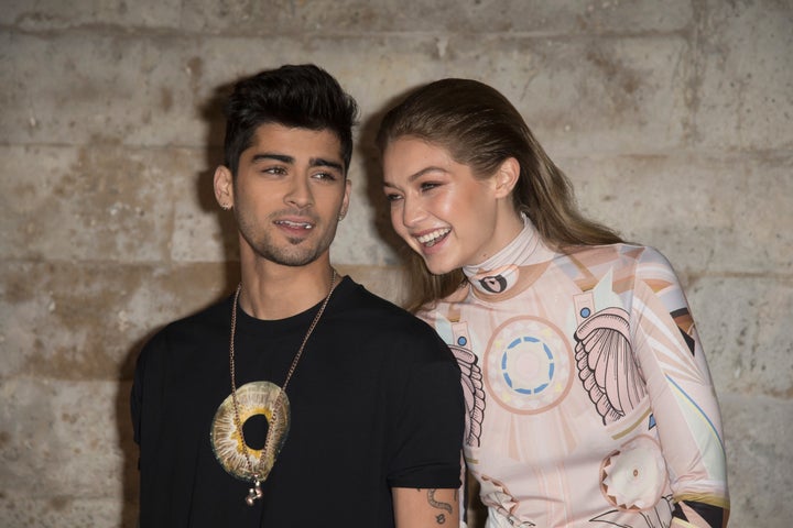 Zayn Malik and Gigi Hadid attend the Givenchy show on Oct. 2, 2016, in Paris.