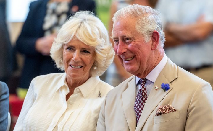 Camilla, Duchess of Cornwall, likely telling Prince Charles to lay off the garlic.