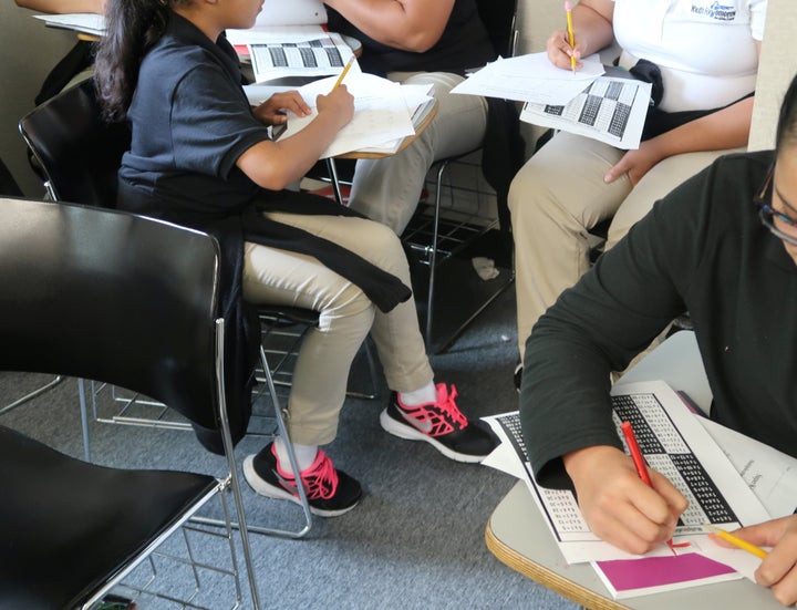 Unaccompanied minors are seen at a facility in Bristow, Virginia, on June 21.
