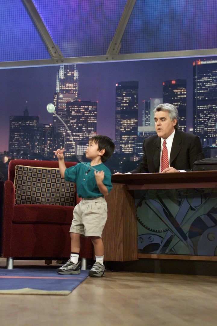 Talented Evan Nagao shows off his skills with host Jay Leno on March 22, 2001 