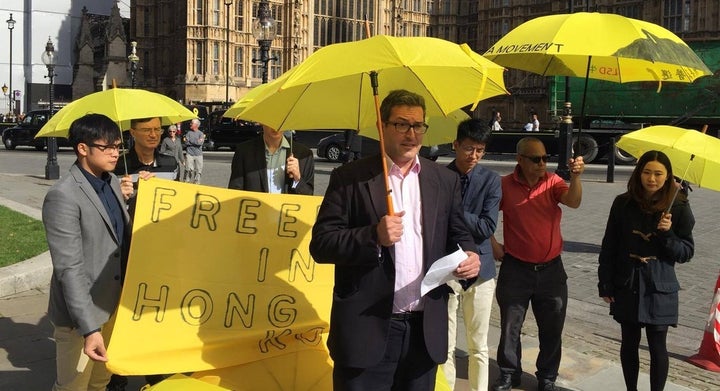 Benedict Rogers speaking at a demonstration outside Parliament