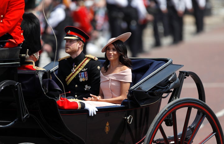 Markle in an off-the-shoulder Carolina Herrera dress at the Trooping the Colour. It's still a similar style to the boat neck neckline she favors. 