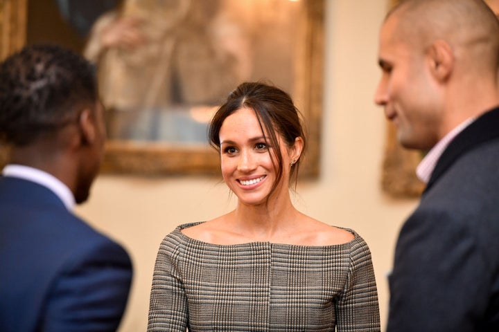 Markle chats with people in Cardiff Castle on Jan. 18. 