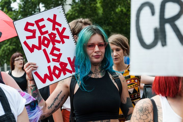 Sex workers protest in central London on Wednesday. Parliament is considering legislation that targets websites. It's similar to a new law in the U.S.