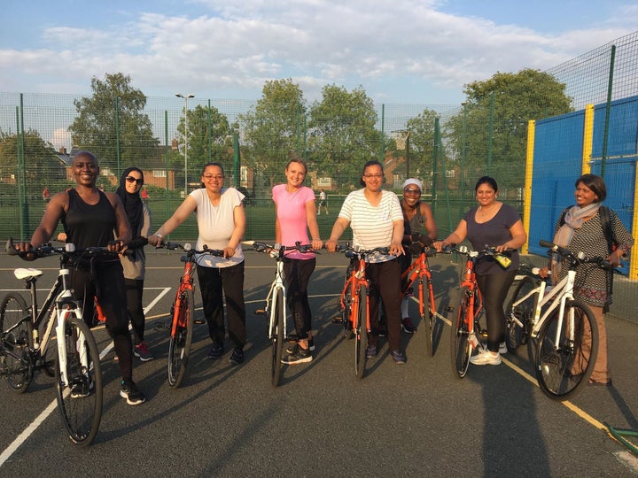 Me (centre, pink top) and the other women in my cycling group. 