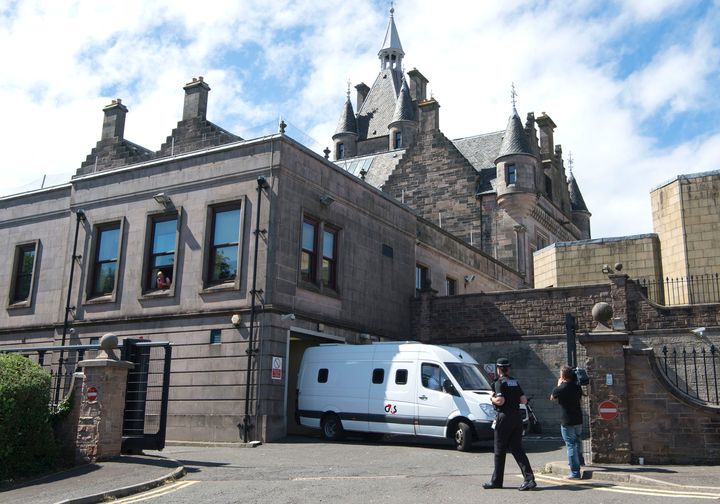 A 16 year old male leaves Greenock Sheriff Court after being charged with the rape and murder of six-year-old Alesha MacPhail on the Isle of Bute.