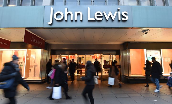 The John Lewis Partnership has issued a profits warning and said that it will close some Waitrose stores as tough trading on the high street takes its toll on the firm.