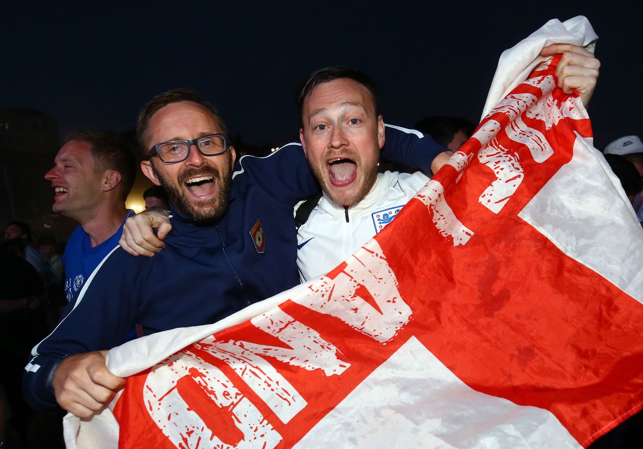 England fans in Brighton celebrate victory after the win against Colombia 