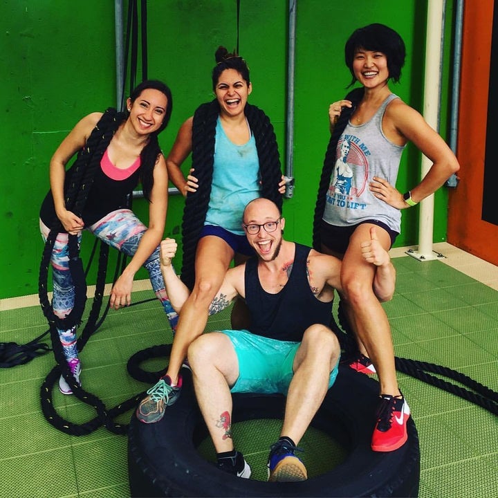 The author (right) with friends at the gym.