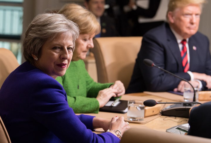 From left, U.K. Prime Minister Theresa May, German Chancellor Angela Merkel and President Donald Trump at the G-7 summit in Canada in June. His testy behavior there could well repeat at the NATO summit in Brussels on July 11 and 12.