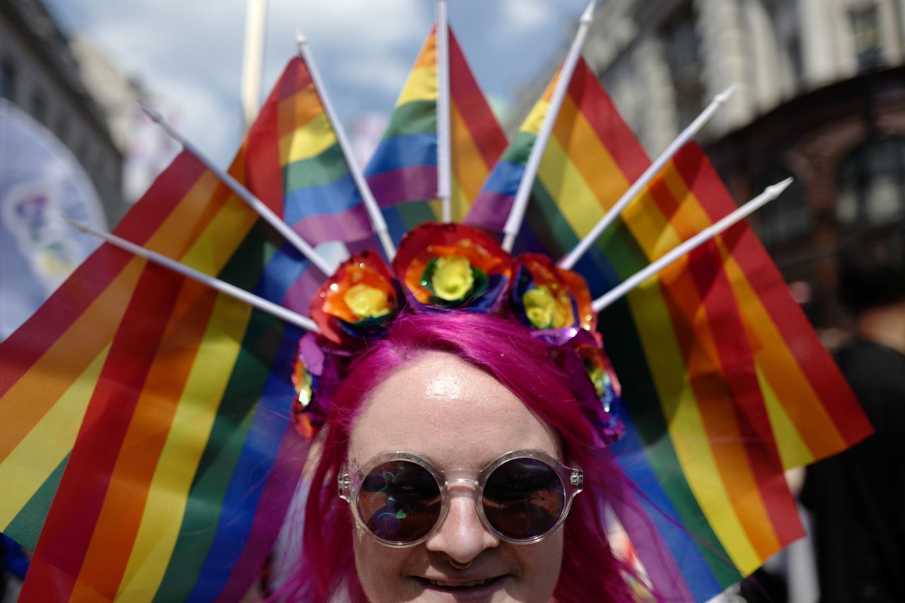 A member of the LGBT community takes part in the annual Pride Parade in London on Saturday 