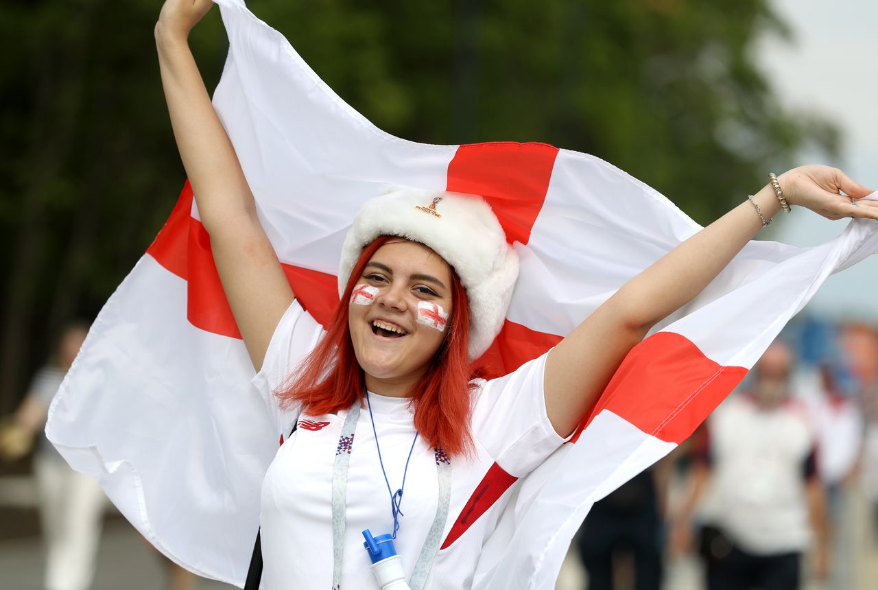 An England fan shows her support outside the Samara Stadium prior to the FIFA World Cup quarter final match against Sweden