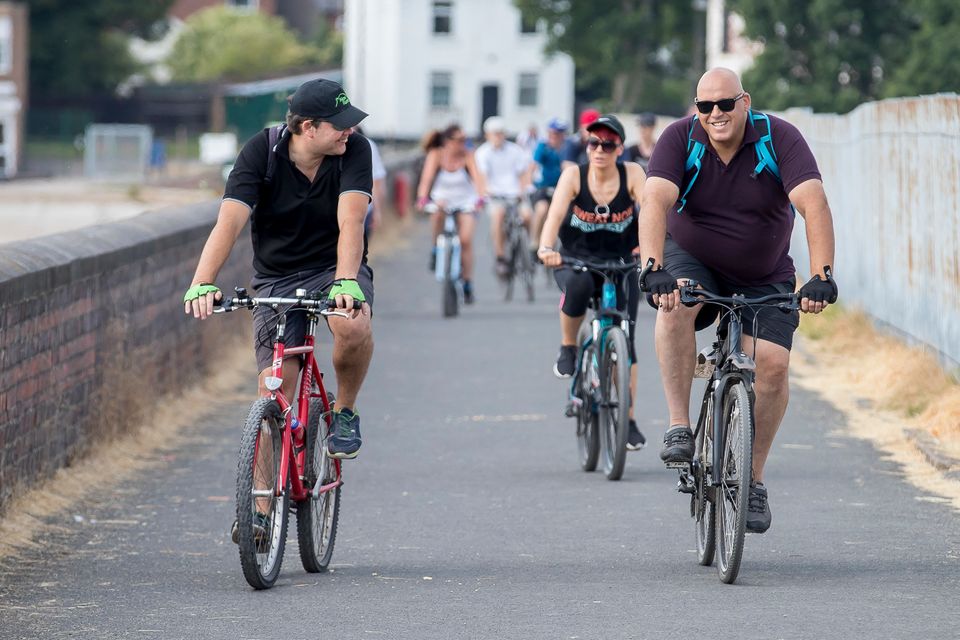 Steve (right) runs the cycling group. 