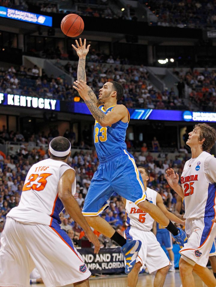 Tyler Honeycutt (top) shoots during a 2011 game when he played for the UCLA Bruins. Honeycutt was found dead early Saturday morning after an hourslong standoff with Los Angeles police.